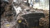 Found a WW2 tractor sunk in the mud