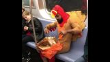 A turkey man eats a turkey in the subway