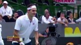 A fan asks Roger Federer to sit still so he can take a picture