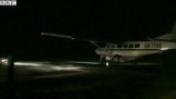 300 vehicles illuminate an airstrip