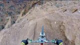 Inverted jump mountain bike over canyon 22 meters