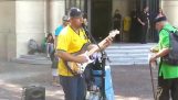 An itinerant musician interprets the "Sultans Of Swing"