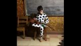 A blind boy playing and singing blues