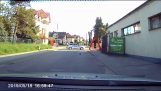 A police car protects a hedgehog