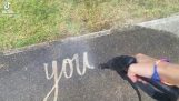 Caligrafía con una prensa de agua.