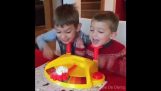 Two children play a very funny game