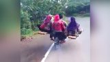 8 people on a motorcycle