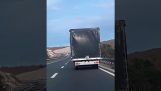 Truck against strong wind