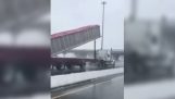 Dump truck collides with bridge