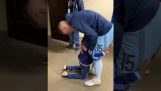 A little boy begs a football player to stay in his team