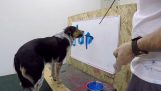 De Jumpy de hond schrijft zijn naam