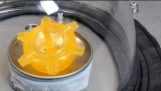 Spinning Top in a Vacuum Chamber