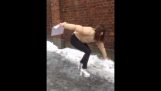 Lady with heels sliding down ice