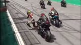Motorcycle rider falls at the start of the race