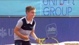 Ball boy against Novak Djokovic
