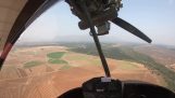Ultralight aircraft makes emergency landing in a field