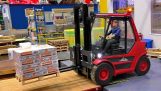 Operator forklift in a miniature storage