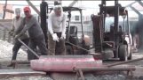 Crazy Chinese smiths. Forge a large flange on the street