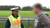 German policeman gives a lesson to the curious drivers