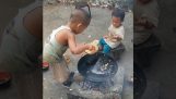 A little boy prepares Cantonese rice