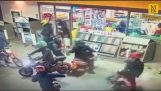 soyguncular Gang Manchester Shop'ta baskını yapar