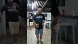 Man doing backflip without spilling his beer