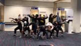 Dancers entertain passengers, where the flight is delayed for 6 hours