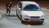 Woman trying to get petrol (Romania)