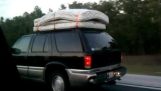 Two mattresses in love on a car
