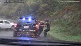 Police officer rescues his colleague