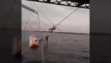 How to pass a sailboat under a bridge;