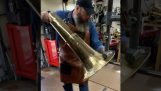 Repair of a tuba by a craftsman