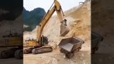 Excavator saves a truck before it overturns