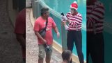 A mime plays a prank on a passerby