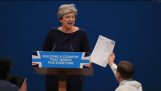 Prankster interrupts Theresa May’s conference speech to hand her fake P45